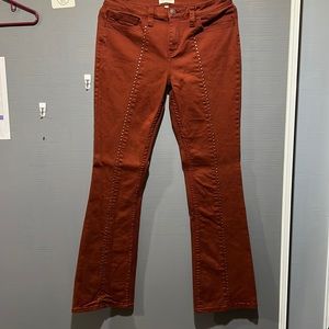 Size 32 Shyanne Rust colored jeans with bronze details